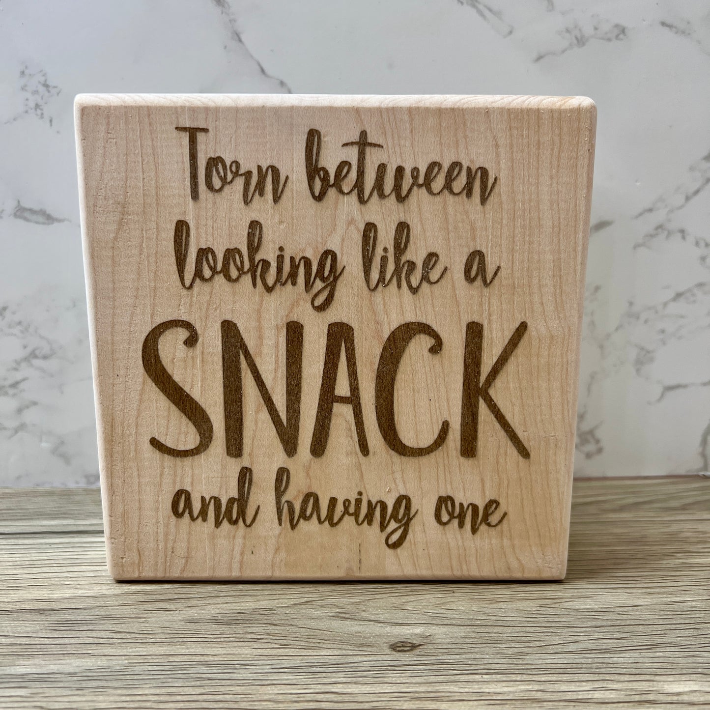 Shelf Sign - Torn between looking like a snack and having one